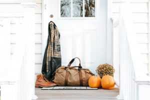 A bag sitting on a porch